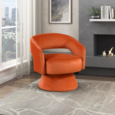 Fauteuil rembourré en velours avec base ronde