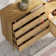 Modern Rattan-Style Entertainment Centre With Ample Storage And Sleek Design
