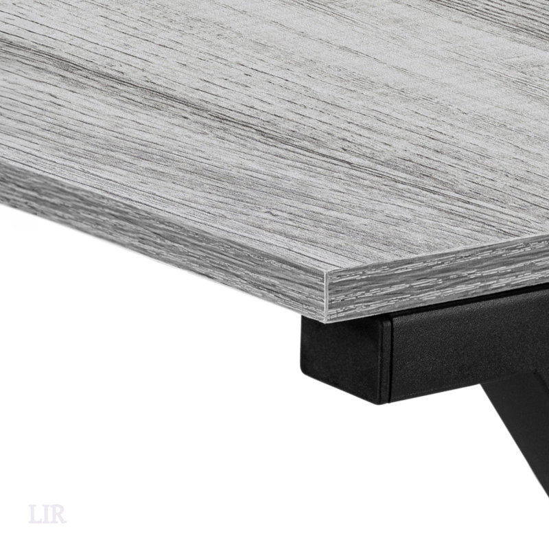 Bureau d'ordinateur contemporain en forme de L avec stratifié gris et métal noir, conception de coin peu encombrante pour le bureau à domicile