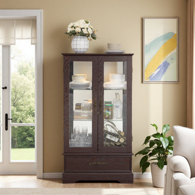 Elegant Lighted Glass Curio Display Cabinet With Adjustable Shelves, 2 Doors, 1 Drawer And Bulb by Wrought Studio