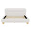 Lit contemporain tapissier à profil bas avec tissu en molleton Teddy et pieds ronds massifs, conception élégante en forme de courbe pour la chambre à coucher