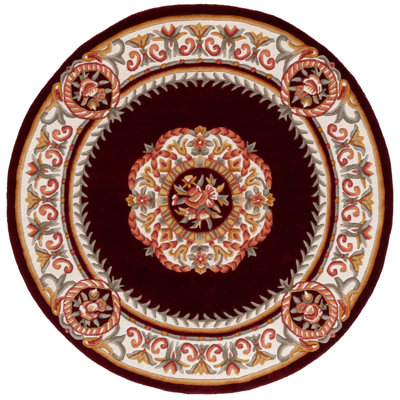 Abrahan Hand Tufted Wool Cotton Floral Rug in Red/Ivory
