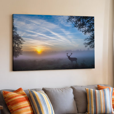 Canvas A Majestic Silhouette Of A Stag With Impressive Antlers Stands Wall Art Prominently In The Foreground Surrounded By A Soft Canvas Wall Art
