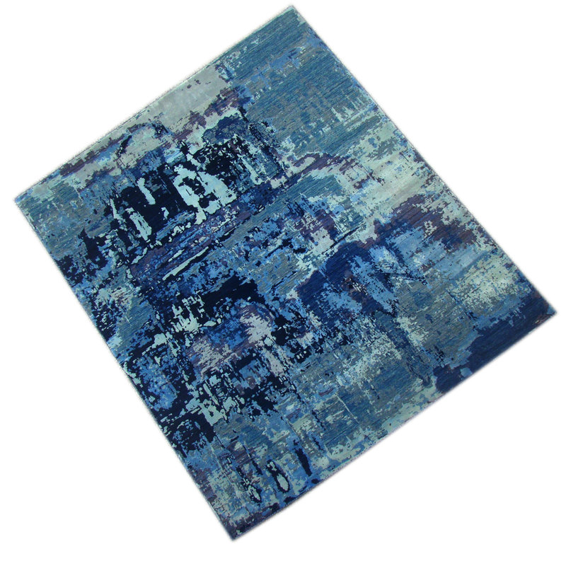 Tapis bleu de haute qualité noué à la main