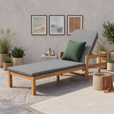 Chaise longue d'extérieur en bois d'acacia avec dossier et coussin ajustables