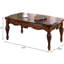 Table basse en cerisier rectangulaire avec pieds tournés, parfaite pour un décor de salon élégant et fonctionnel.