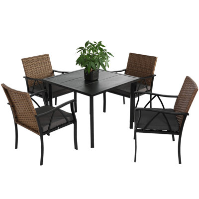 Ensemble repas extérieur pour 4 personnes avec coussins