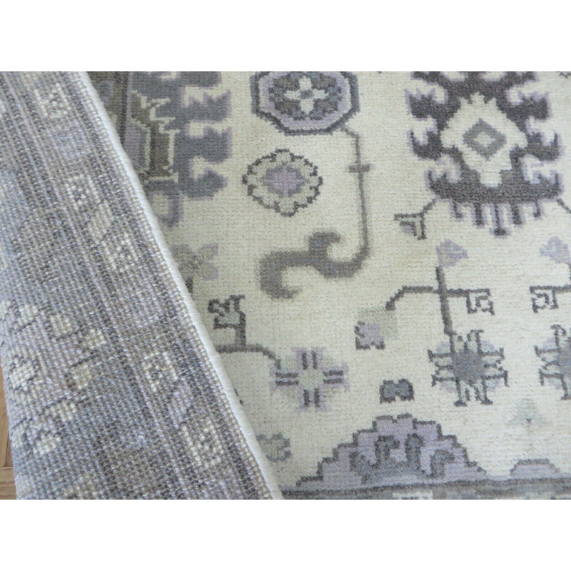 Tapis oriental ivoire noué à la main 5 pi 1 po x 8 pi 10BC3E52A33B40389B431CA90D8A3E5