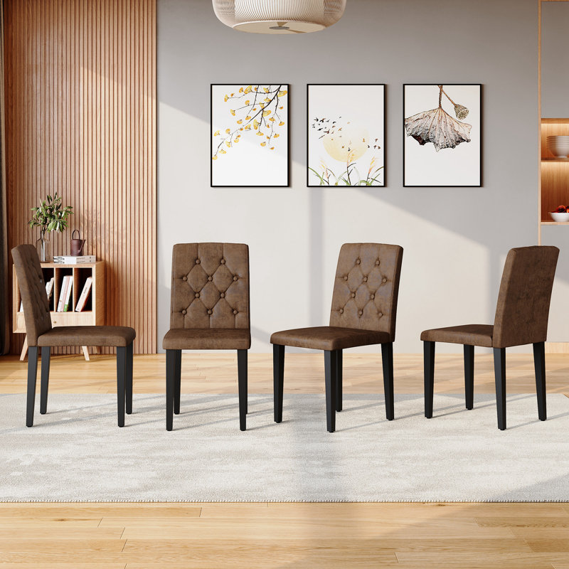 Ensemble de 4 chaises de salle à manger en suède brun: comprend un dossier capitonné, une hauteur de 35 po et des pieds en métal noir. Combine esthétique et confort. Convient aux salles à manger, aux bureaux, etc.