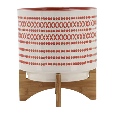 Ceramic Planter for Indoor and Outdoor Use Orange Planter with Aztec Design on Wooden Stand