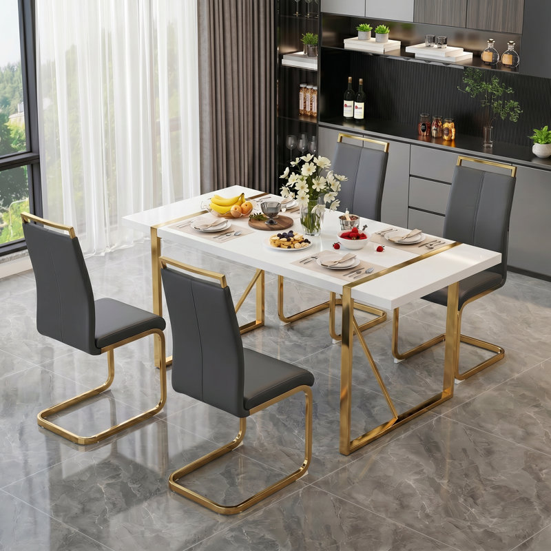 Ensemble de salle à manger 5 pièces rectangulaire moderne avec table haute brillance et chaises en porte-à-faux en similicuir
