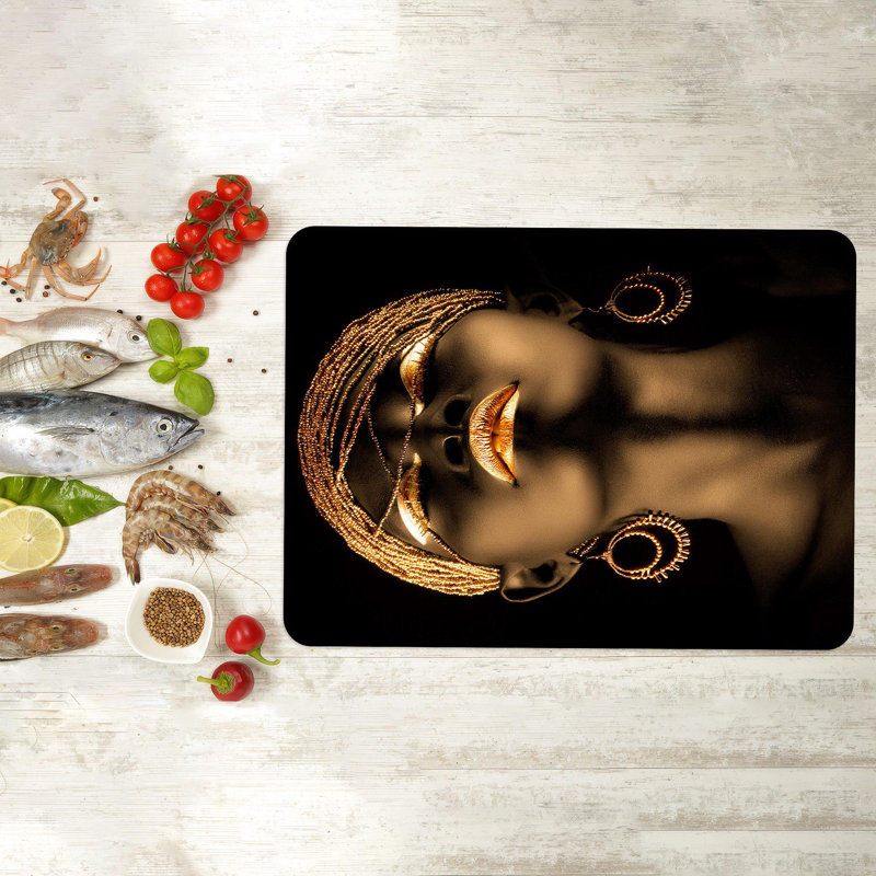 Planche de service aux accents dorés en noir et or faite de matériaux de verre de haute qualité pour la cuisine