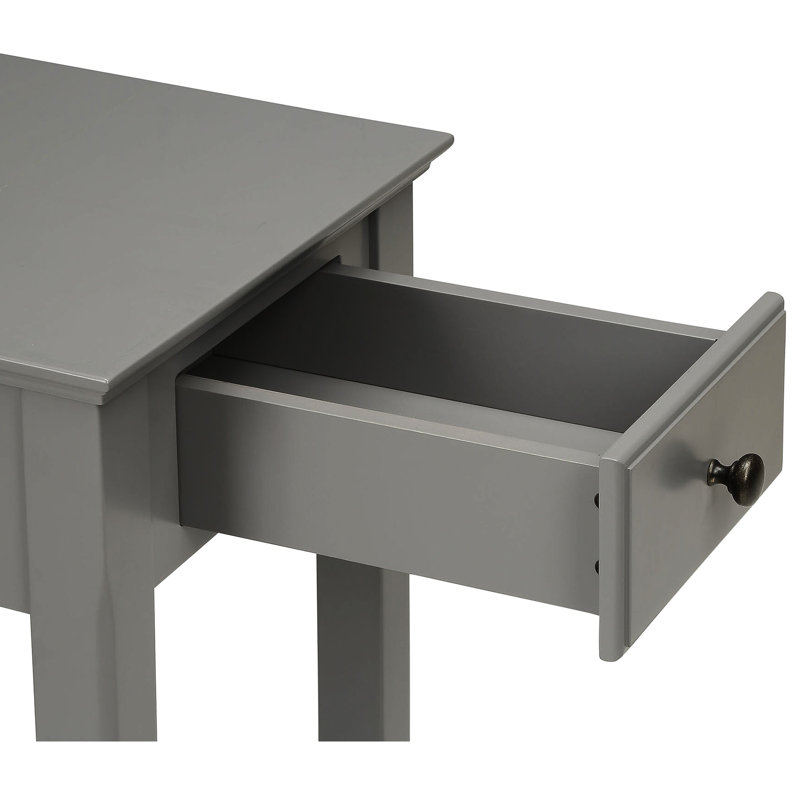 Table rectangulaire grise avec rangement ouvert sur la tablette inférieure et les pieds