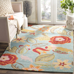 Emrick Floral Handmade Looped Wool Red/Blue Area Rug