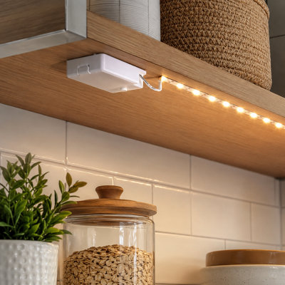 Three 40 Inch cordless LED strips form this battery-powered 3 Pack, providing 2700K warm-white lighting for indoor shelves and under-cabinet use.