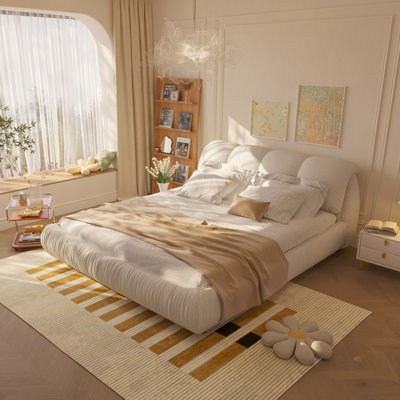 Lit plateforme tapissier de luxe avec dossier rembourré surdimensionné et structure en bois massif, convenant à plusieurs hauteurs de matelas