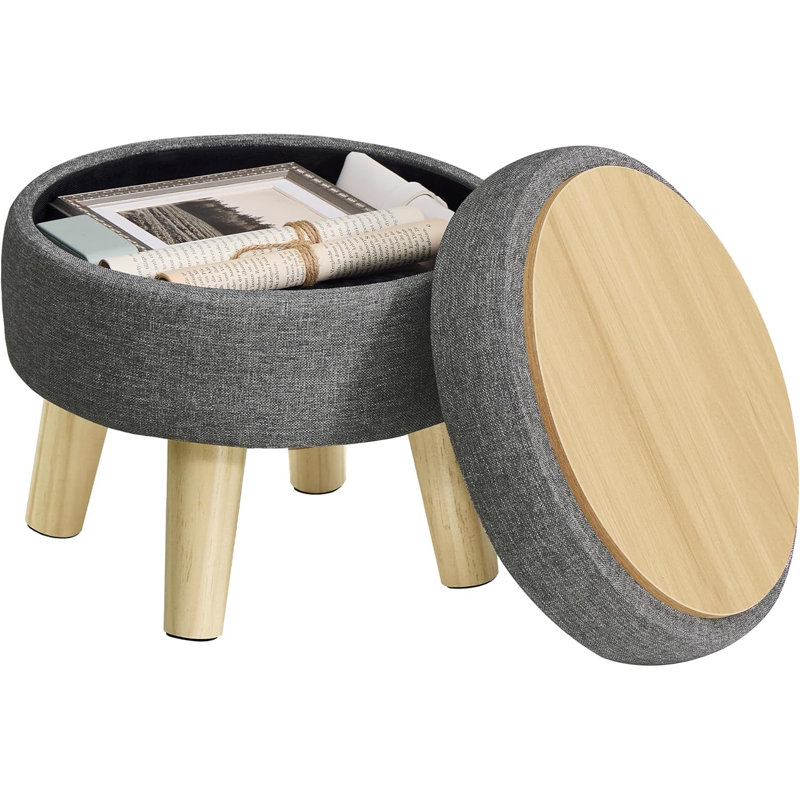 Round footstool with cushioned seat
