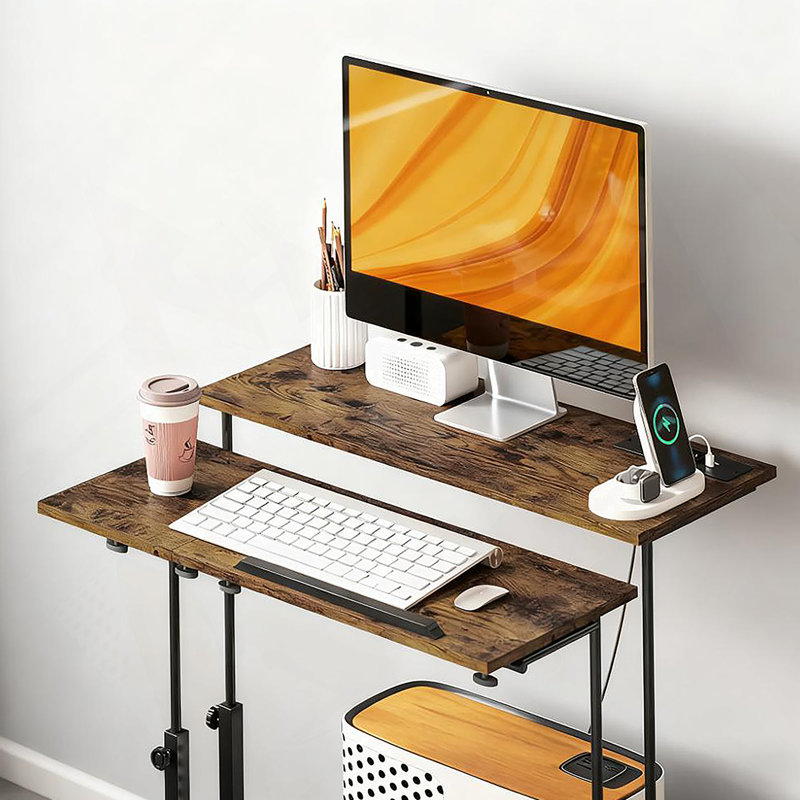 Bureau debout réglable avec plateau inclinable, station de charge intégrée et roues verrouillables pour une productivité et un confort accrus