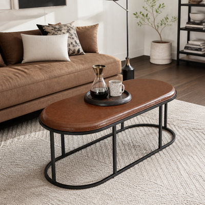 Table basse ovale en similicuir, table centrale rembourrée avec base en métal