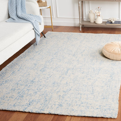 Tapis en laine / coton touffeté à la main Fredi bleu clair / ivoire