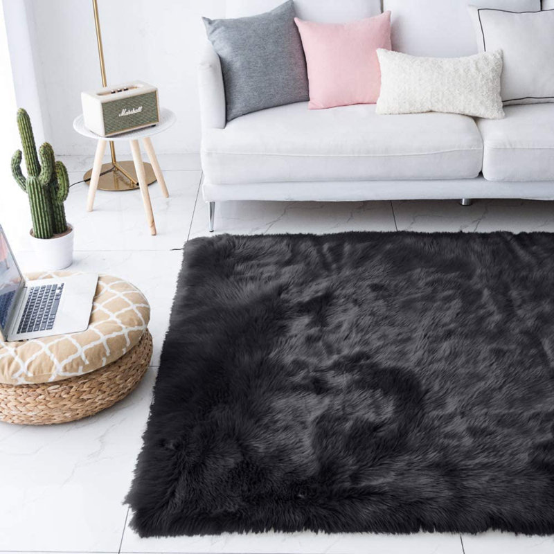 Tapis noir à motif animalier 5 pi x 7 pi