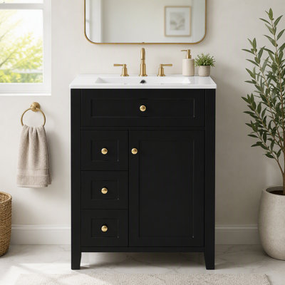Meuble-lavabo avec porte à fermeture amortie, plusieurs tiroirs et lavabo en céramique