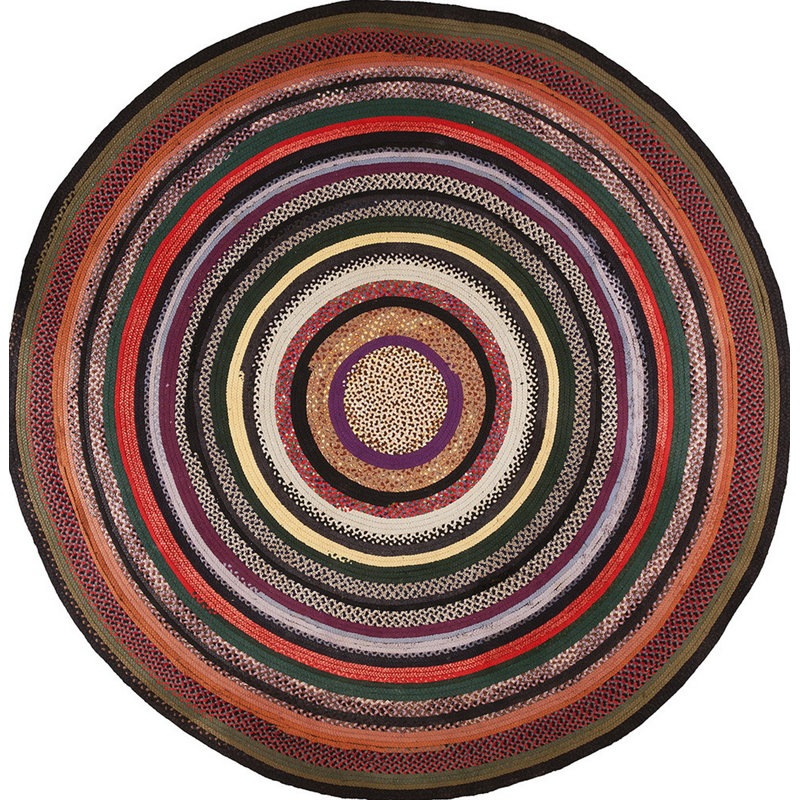 Tapis rond tressé antique à motif circulaire