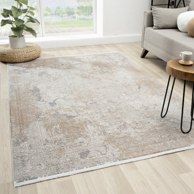 Tapis marocain beige à franges abstraites