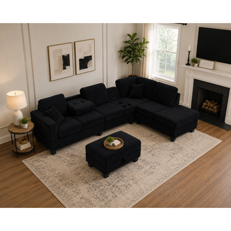 Vega Reversible Faux Fur Sectional with Media Console And Storage Ottoman, Black Carduroy