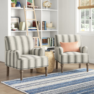 Arching Armchair With Solid Wood Turned Legs and Nailhead Trim