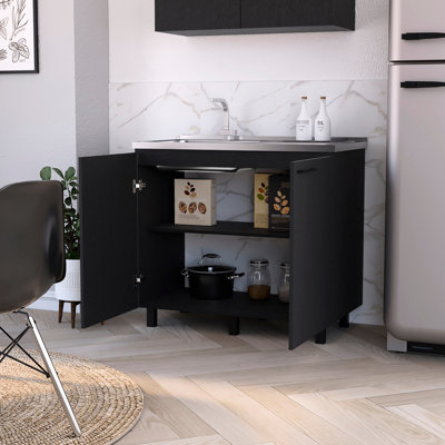 Évier et armoire utilitaire noirs avec portes élégantes avec rangement pratique pour l'espace de cuisine