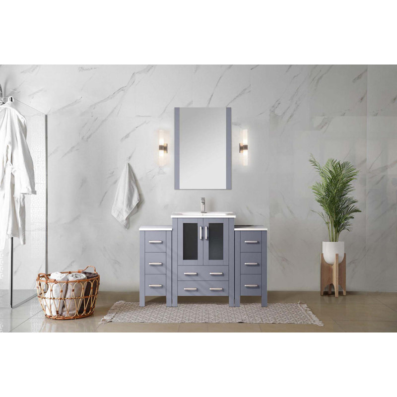 Meuble-lavabo gris foncé avec armoires latérales, ensemble de robinets, comptoir en céramique blanche et Miroir