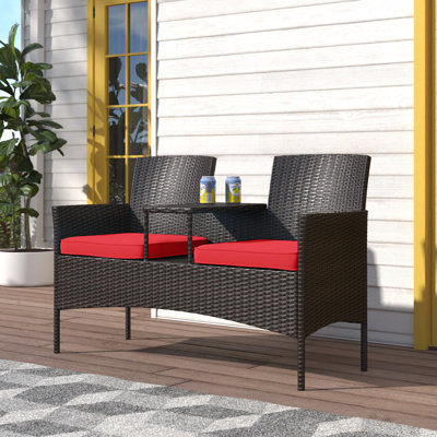 Jaylyn Modern Outdoor Rattan Loveseat with Built-in Coffee Table and Cushions by Zipcode Design