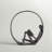 Krahn Encircled Reader Iron Figurine