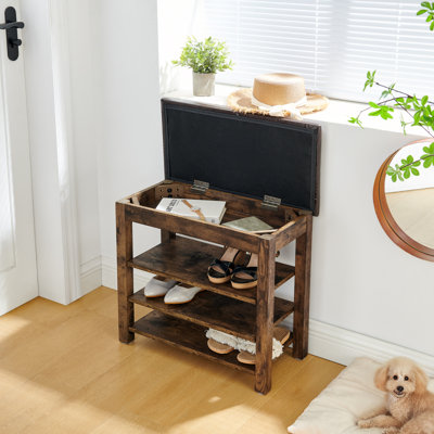 Un banc à langer réglable en hauteur en bois de haute qualité, équipé d'un siège confortable et d'un espace de rangement dissimulé, en bois grainé gris anthracite, rétro