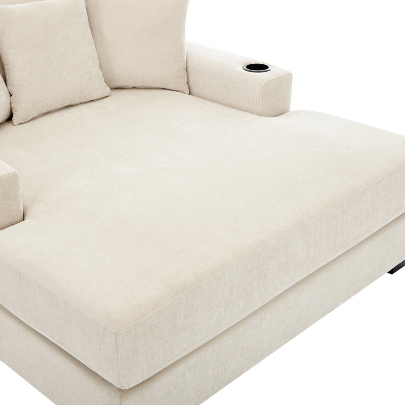 Chaise longue de 140 cm en chenille crème avec station de charge et porte-gobelets intégrés aux accoudoirs pour un confort optimal à l'intérieur. Housse amovible et lavable surdimensionnée pour se détendre à la maison.