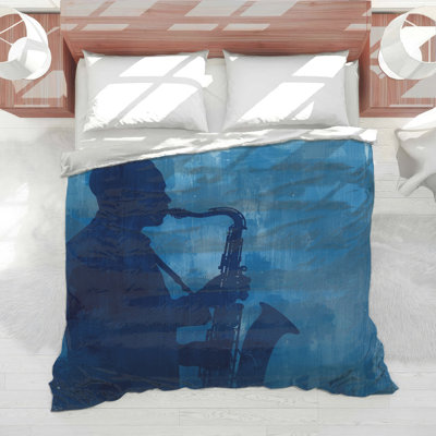 Édredon bleu à silhouette de saxophone