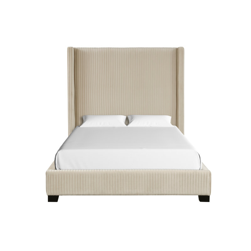 Grand lit tapissier dans une boîte beige