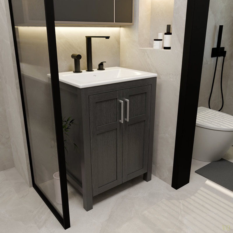 Une armoire de salle de bain de 24 pouces, jumelée à un lavabo en céramique, possède un design moderne et est faite de matériaux imperméables et durables.