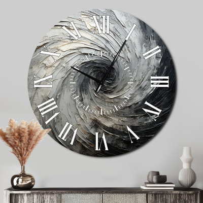Horloge murale grise et noire