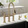 KRAUS Allyn Transitional Bridge Kitchen Faucet with Pull-Down Sprayhead