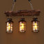 Luminaire suspendu rustique en métal et bois à 3 lampes 