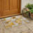 2' X 3' Orange and Ivory Abstract Washable Indoor Outdoor Area Rug