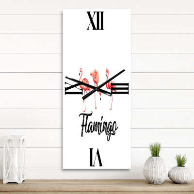 Horloge murale trois flamants roses
