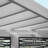 Backyard Discovery Ridgedale 12' x 8' Modern Galvanized Steel Cabana Corner Pergola with Shade Sail Canopy and Conversation Seating-62259723