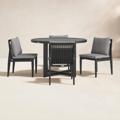 Trosclair Round 4 - Person 48'' Long Dining Set with Cushions