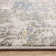 Delanor Abstract Ivory/Blue Area Rug