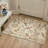 Aura Floral Machine Washable Beige Indoor Area Rug with Non-Slip Backing-189221006