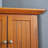 Elegant Corner Cabinet with Generous Storage and Durable Design, Perfect for Maximizing Space and Enhancing Home Decor.-682823331