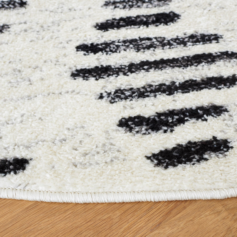 Tapis ivoire / noir Castonguay, Rond 4 pi
